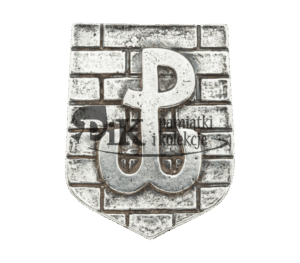 Przypinka Symbol Polska Walcząca na fragmencie muru